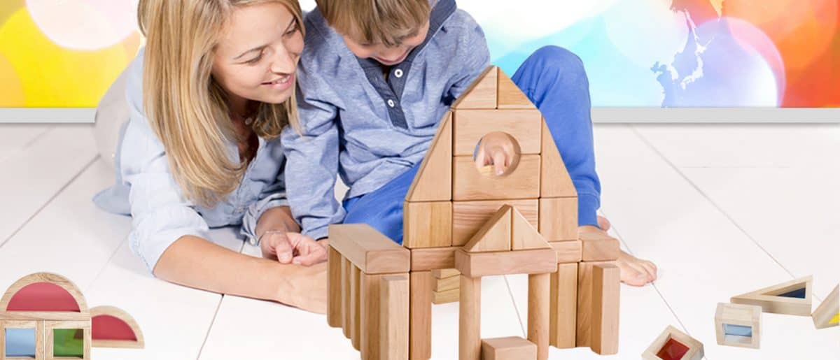 wooden toy blocks-building sets-mother and son on the floor building with wooden building blocks
