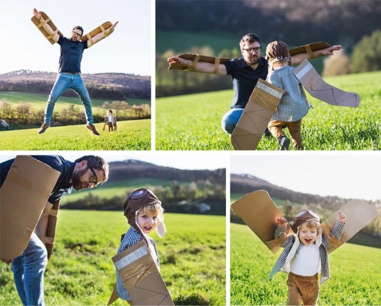importance of creativity-creative skills-creative play- father and son engaged in imaginative play as airplanes and pilots