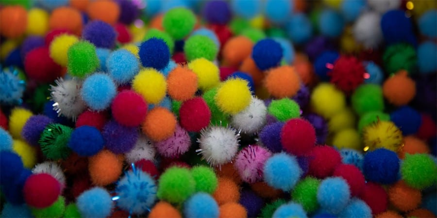 hand strengthening activities for kids-pile of pom poms for sorting activities